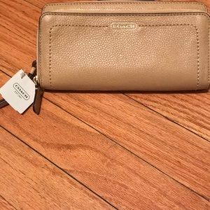 Brand new tan accordion style Coach wallet